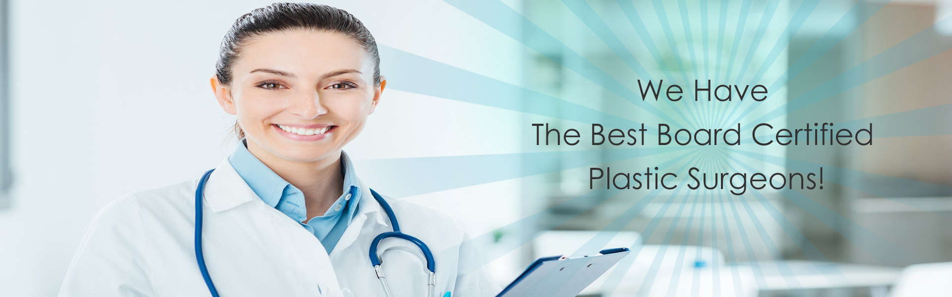 Picture of a smiling female doctor, wearing a white smock and stethoscope, and smiling while looking directly at the camera.